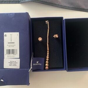 Swarovski Solitaire & Dangle Earrings Gold never used